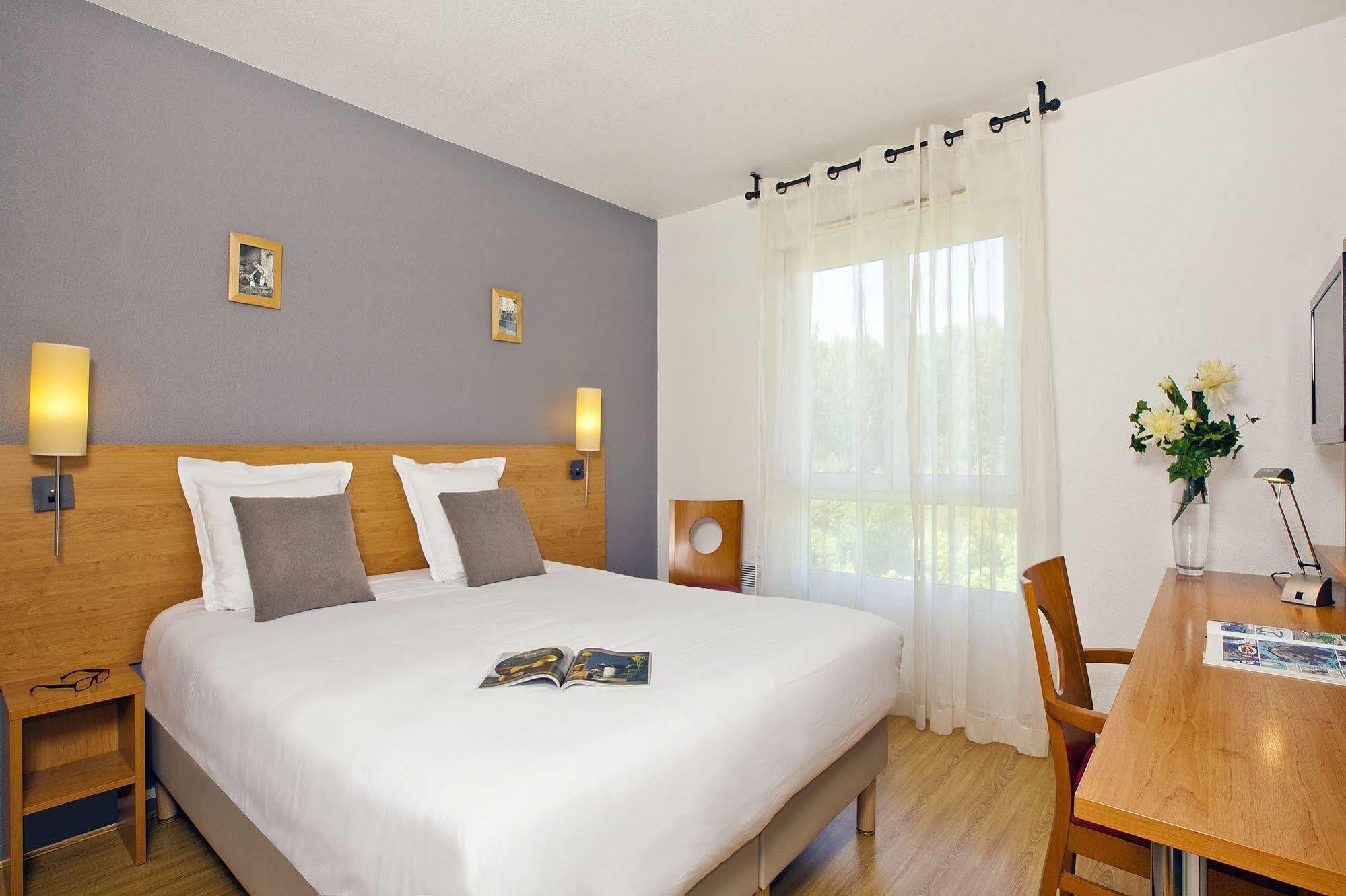 Sejours & Affaires Annecy Le Pont Neuf Aparthotel Cran-Gevrier Exterior photo